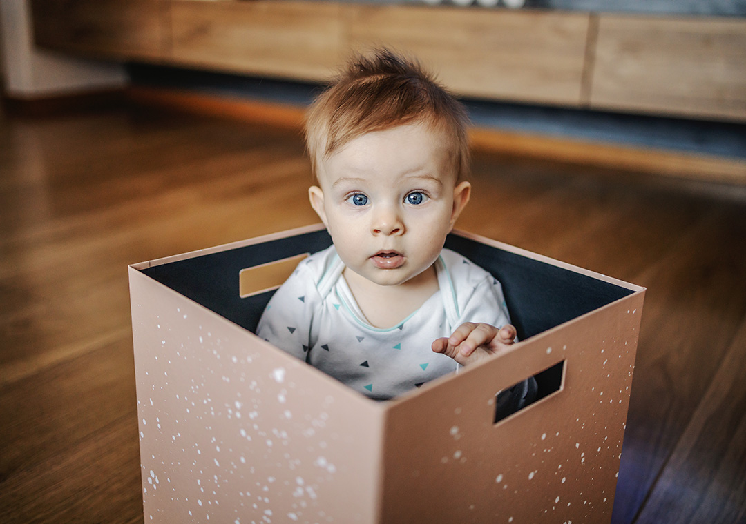 A picture of a baby in a box
